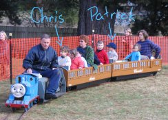 Patrick and Christopher riding in Annie and Clarabel